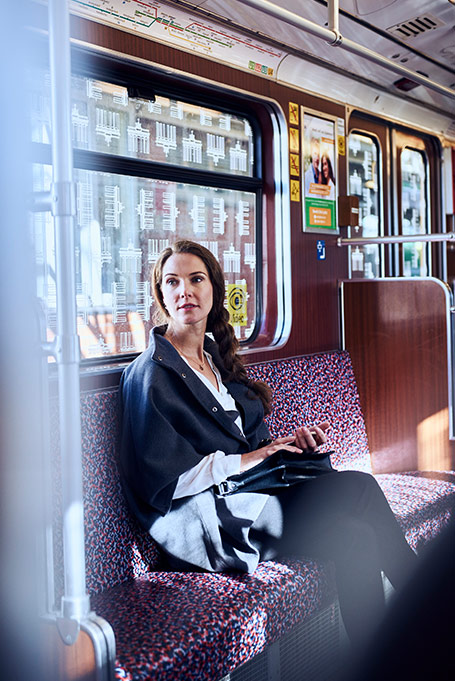 Woman in a public conveyance (photo)